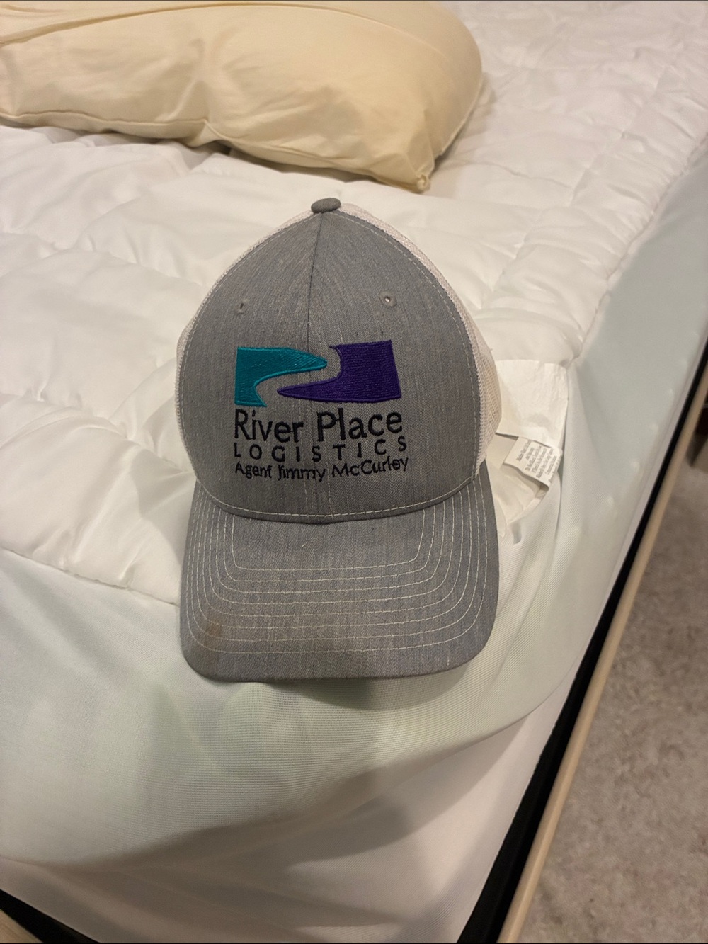 River Place Logistics Embroidered Trucker Hat - Gray with Teal & Purple Logo